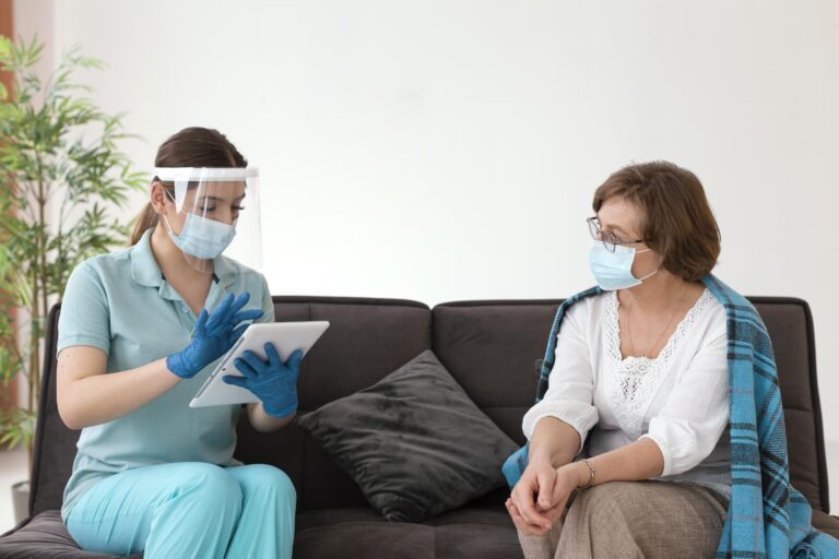 medium-shot-woman-checking-patient-768×512